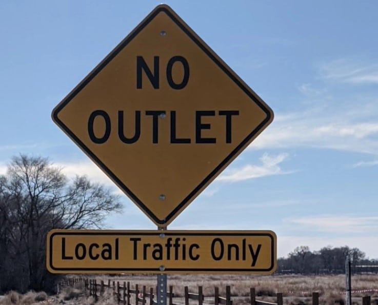 Why are no outlet signs sometimes ignored